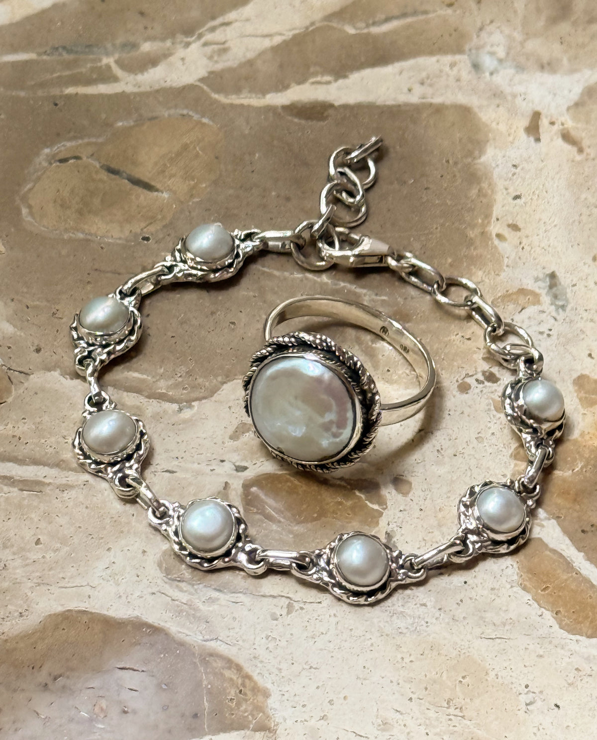 Silver bracelet with pearls