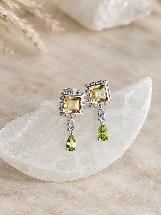Silver earrings with citrine, peridot, and topaz crystals