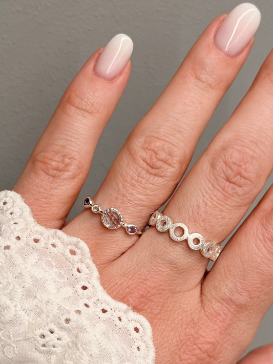 Silver ring with assorted crystals