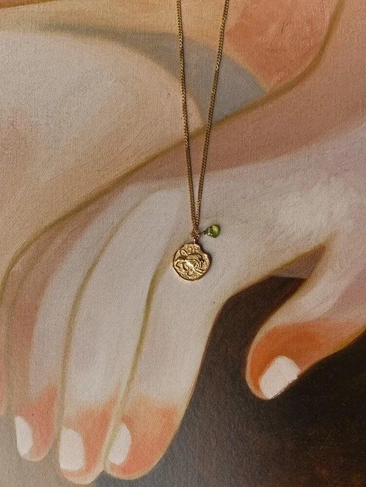 Grandinėlė su peridotu "Liūtas"