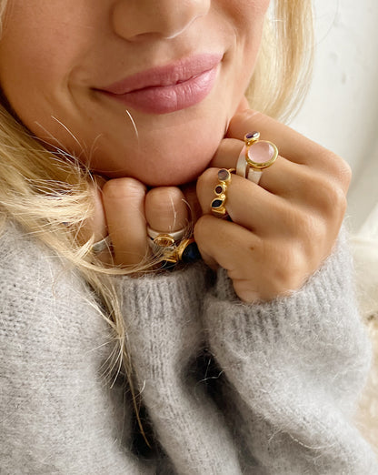 Ring with labradorite and garnet crystals