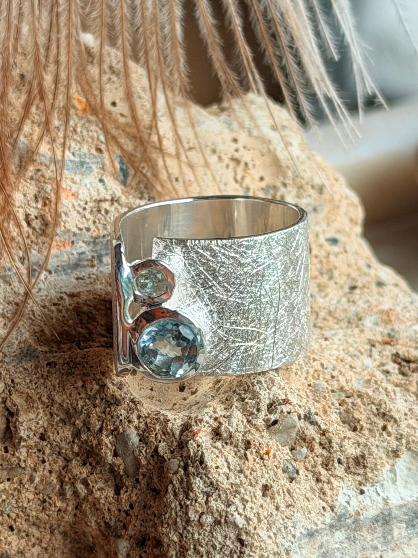 Silver ring with topaz