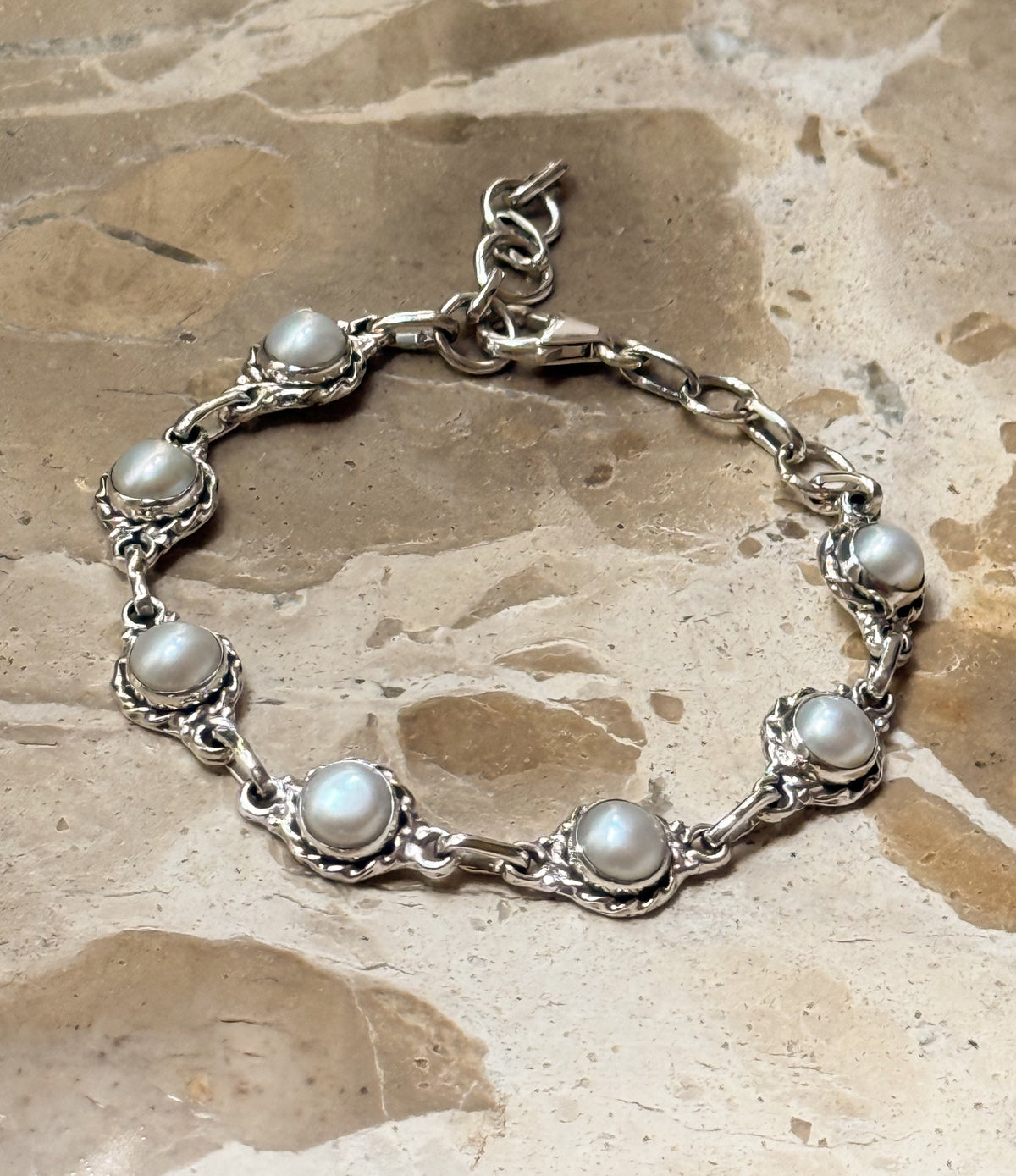 Silver bracelet with pearls