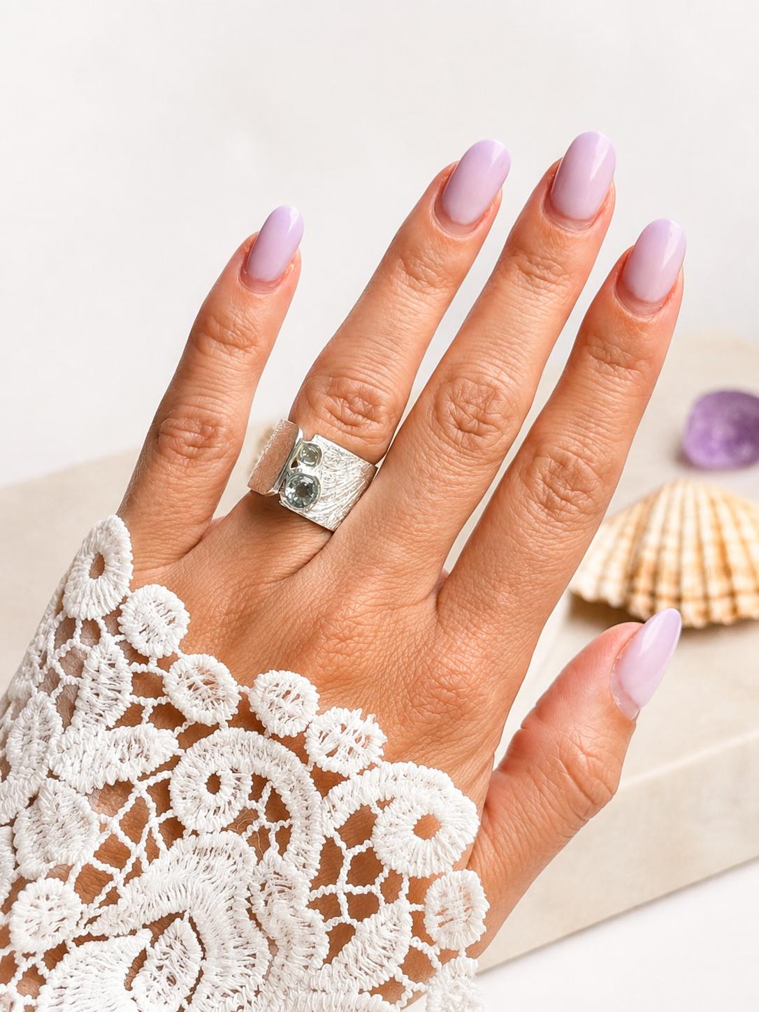 Silver ring with topaz