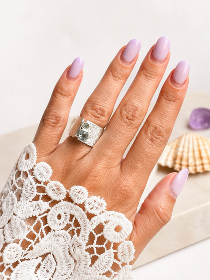 Silver ring with topaz