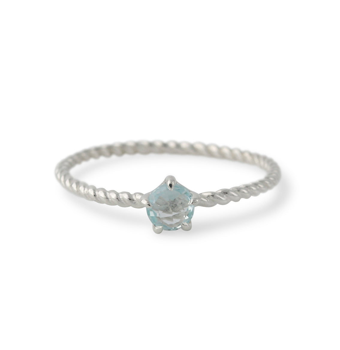 Silver ring with topaz