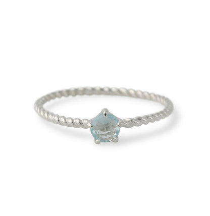 Silver ring with topaz