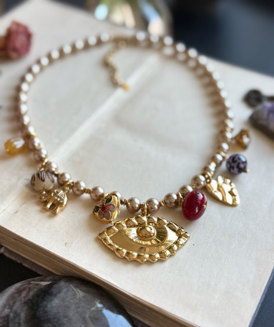 Kaklo papuošalas “Aukso akis”