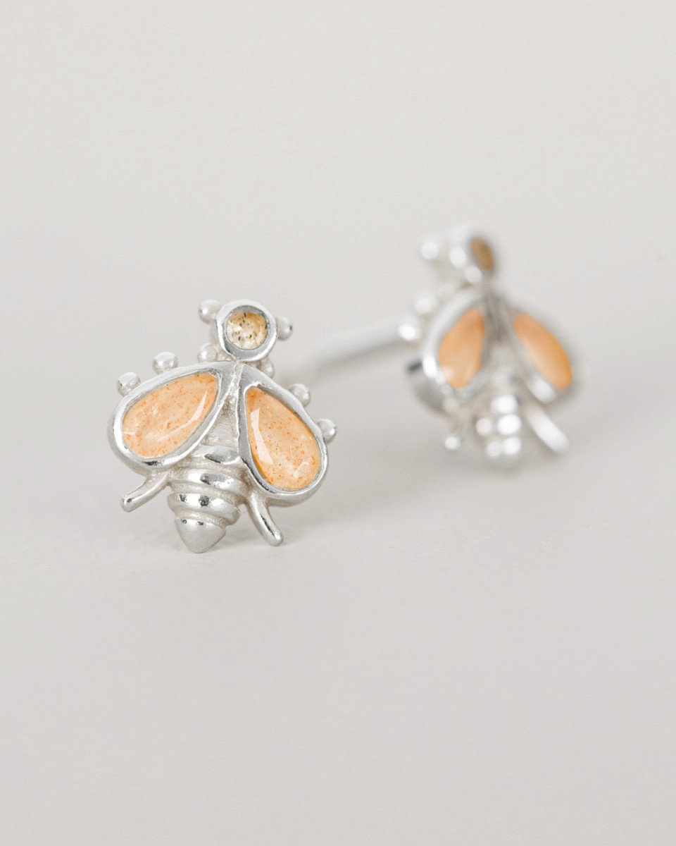 Silver earrings with peach moonstone crystals