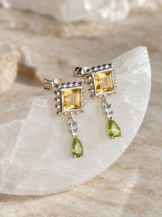 Silver earrings with citrine, peridot, and topaz crystals