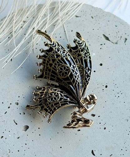 Butterfly metamorphosis brooch