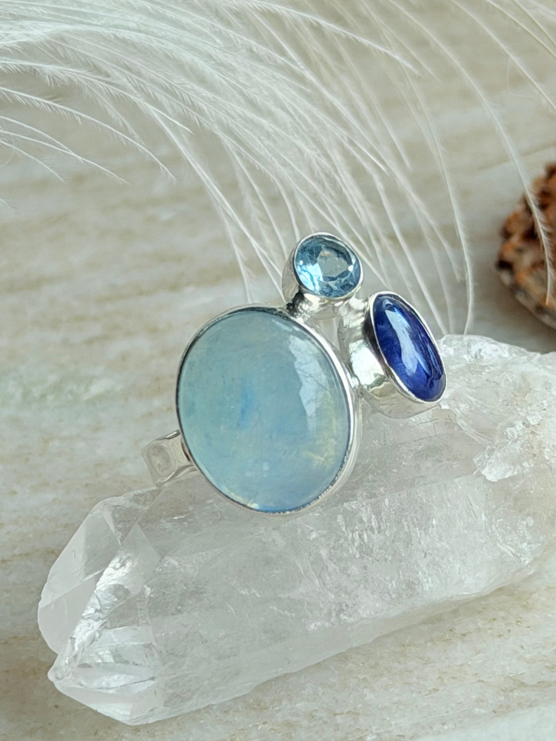 Silver ring with blue chalcedony, kyanite and topaz