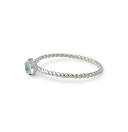 Silver ring with topaz