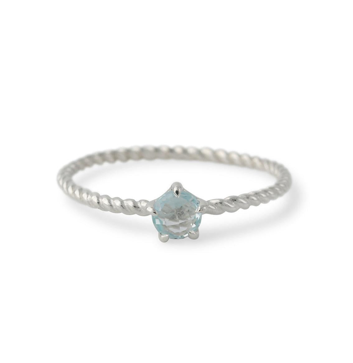Silver ring with topaz