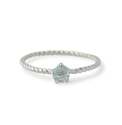 Silver ring with topaz