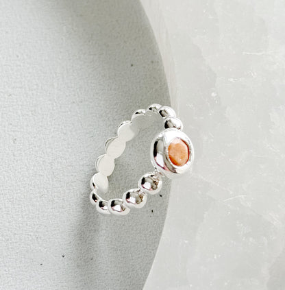 silver ring with peach moonstone