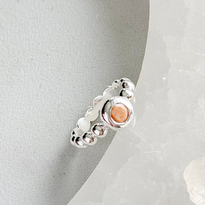 Silver ring with peach moonstone
