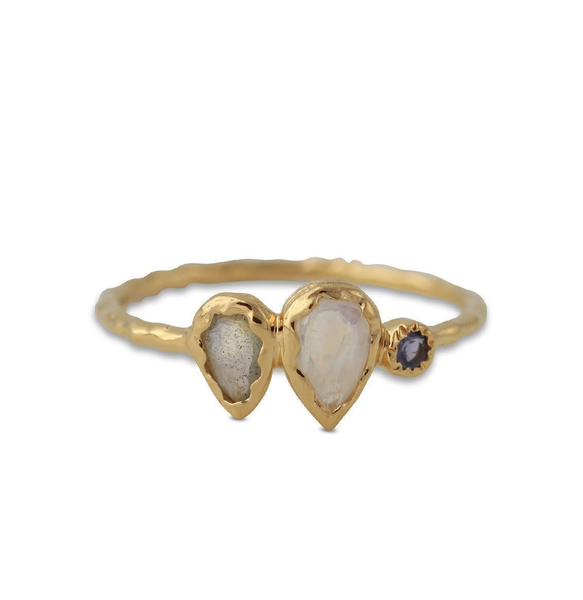 Ring with labradorite, moonstone, and iolite crystals