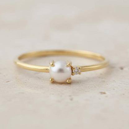 Žiedas su perlu ir topazu