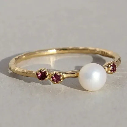 Žiedas su rodolitu ir perlu