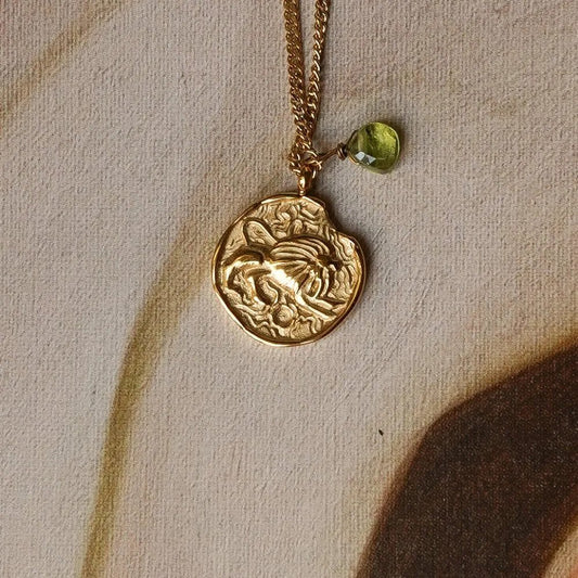 Grandinėlė su peridotu "Liūtas"